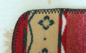 Handvernähte Einfassung