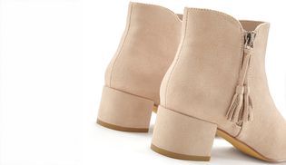 Praktischer Reißverschluss mit modischen Tasseln