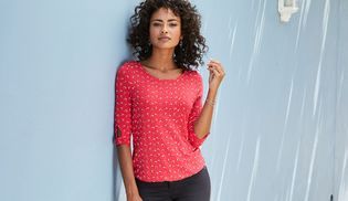 Knotendetails und Cut outs am Ärmelende