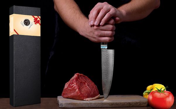 Uber das Damast Kochmesser mit 67 Lagen Damaststahl mit Blau Harzgriff