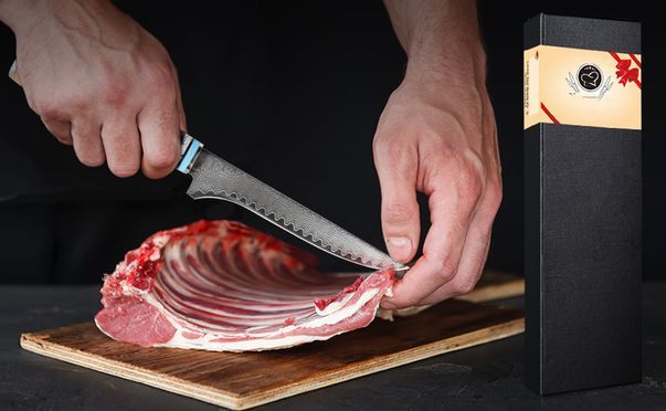 Uber das Damast Ausbeinmesser aus 67 Lagen Damaststahl mit Blau Harzgriff