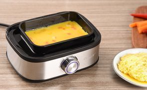 Machen Sie reichhaltigen Eierpudding