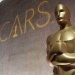 Schriftzug Oscars hinter Oscar Troph&auml;e