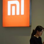 Xiaomo-Logo und -Userin
