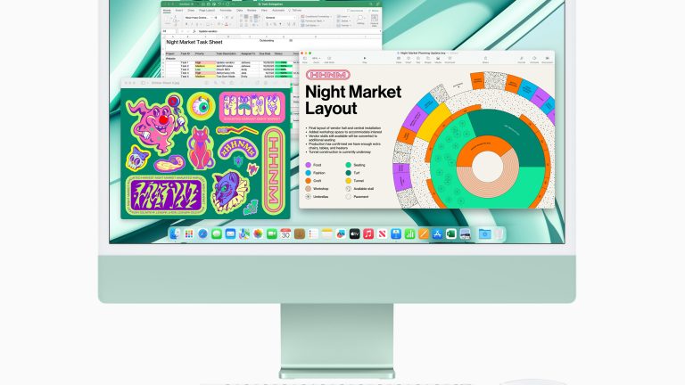 Ein iMac in Grün mit passender Tastatur und Maus.